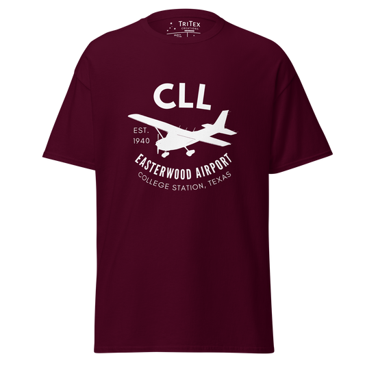 A maroon t-shirt featuring a silhouette of a Cessna airplane with the words "CLL Est. 1940 Easterwood Airport College Station, Texas".