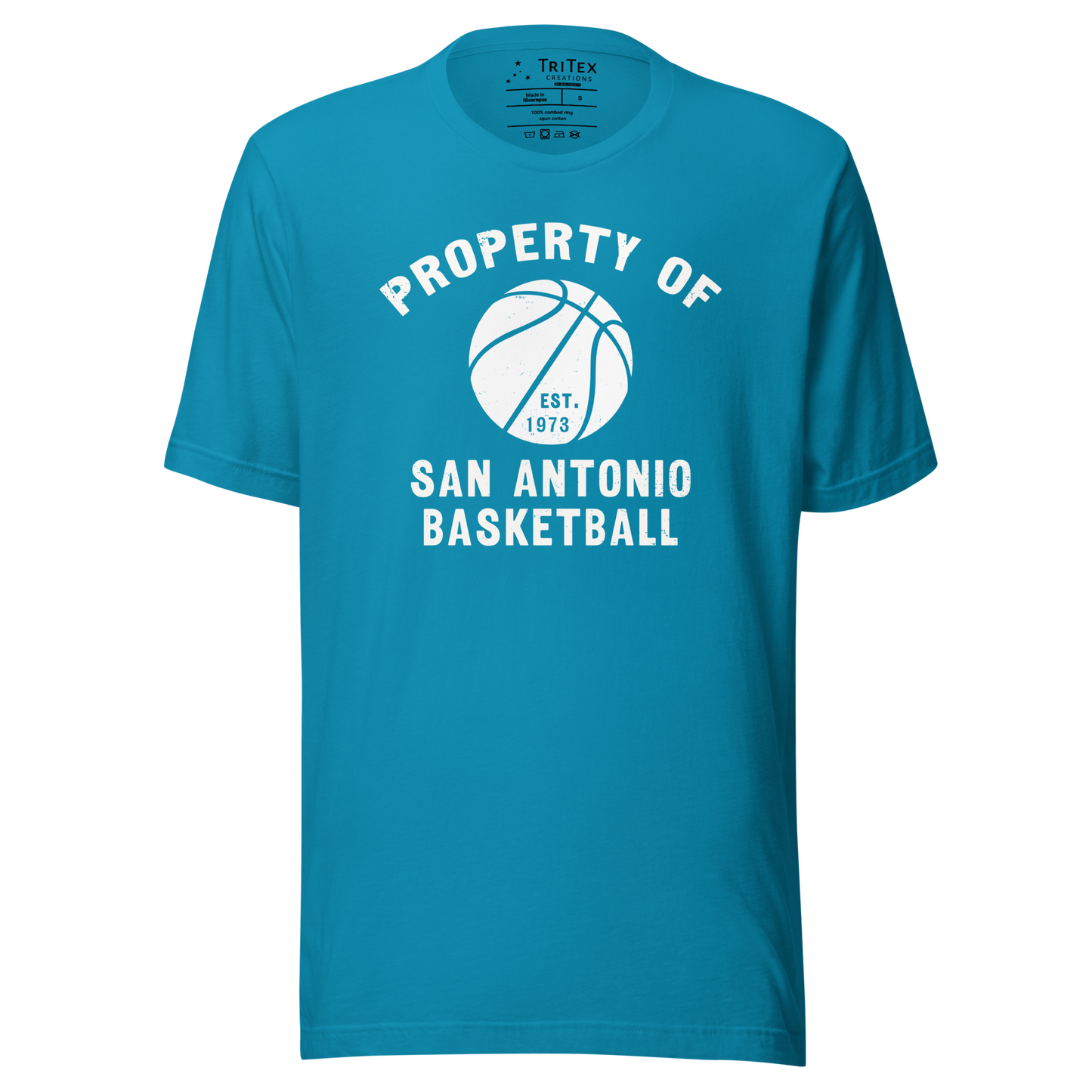 An aqua t-shirt featuring a silhouette of a basketball with the words "Property of San Antonio basketball Est. 1973".