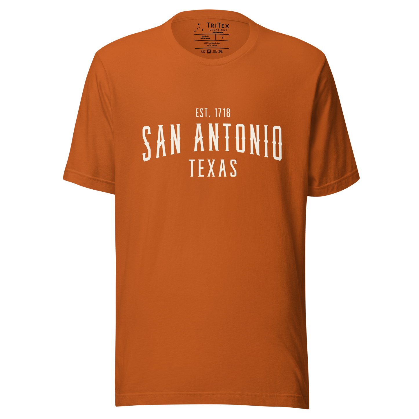 An autumn-colored t-shirt with the words "San Antonio Texas Est. 1853".