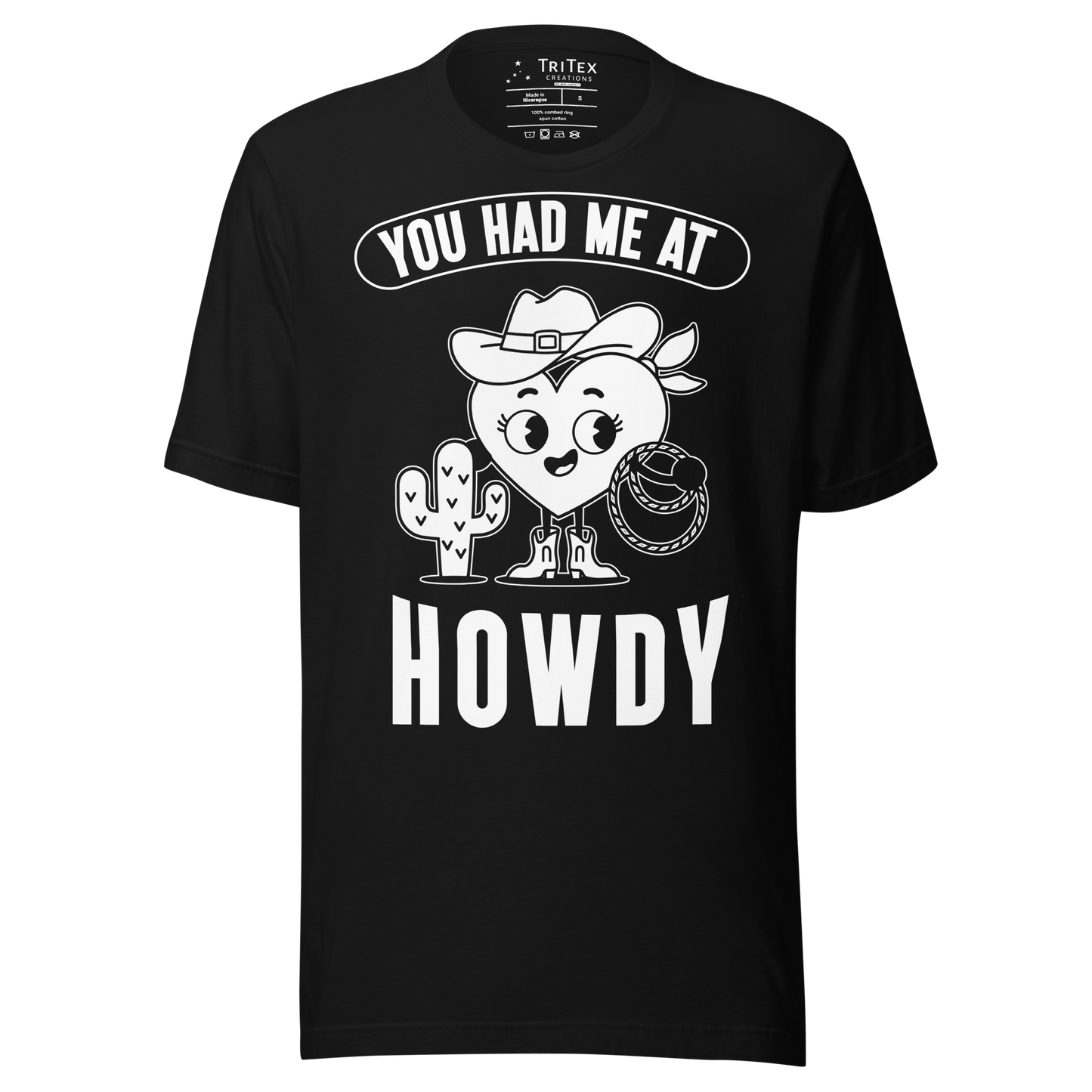 A black t-shirt featuring a cartoon heart dressed like a cowboy with the words "You has me at howdy".
