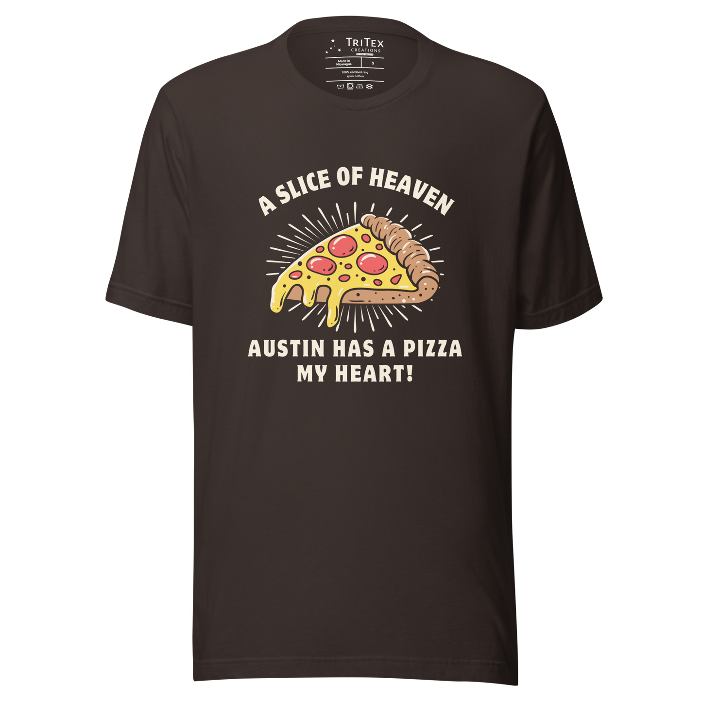 A brown t-shirt featuring an image of a slice of pizza with the words" A slice of heaven Austin has a pizza my heart!".