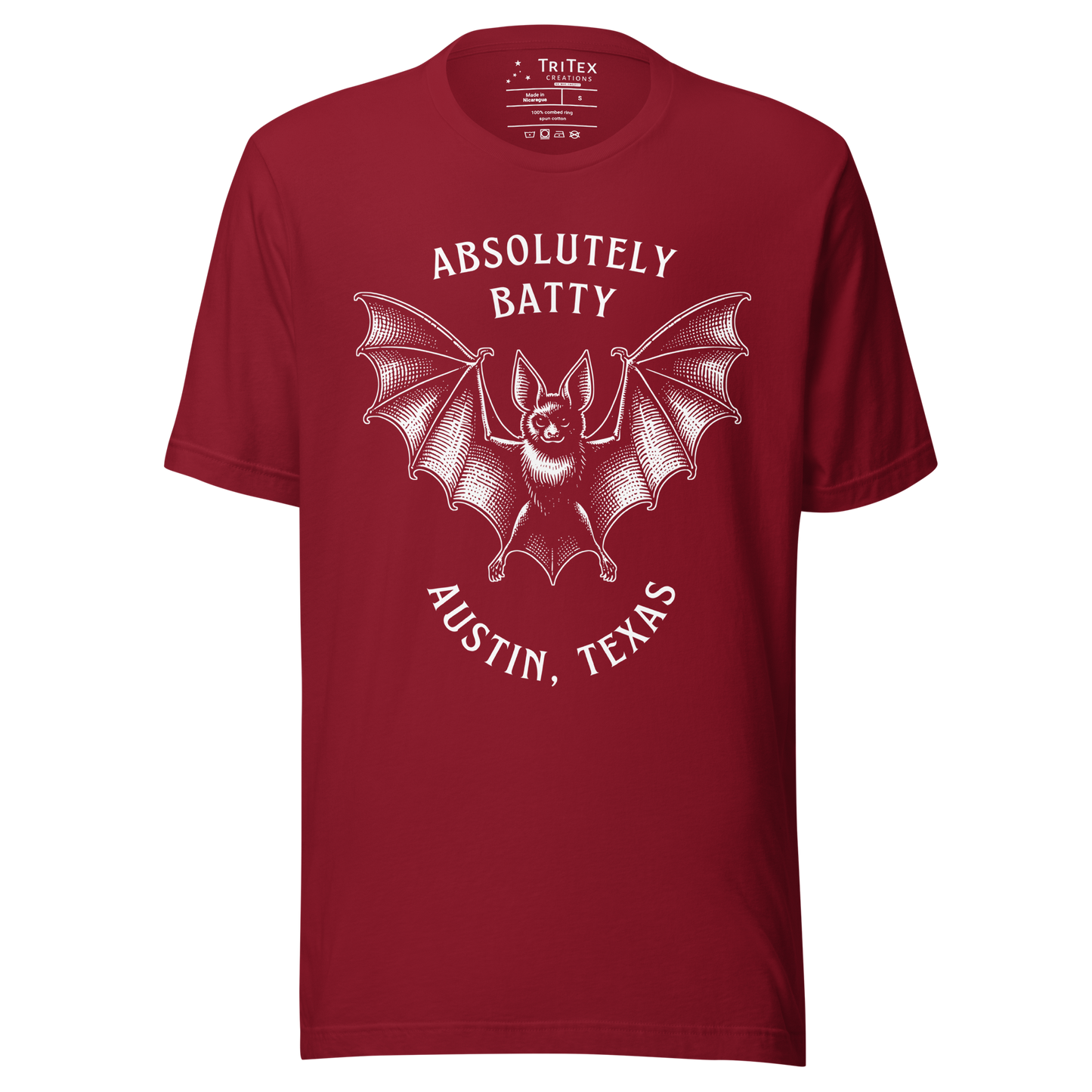 A cardinal red t-shirt featuring an illustration of a bat with the words "Absolutely batty. Austin, Texas".