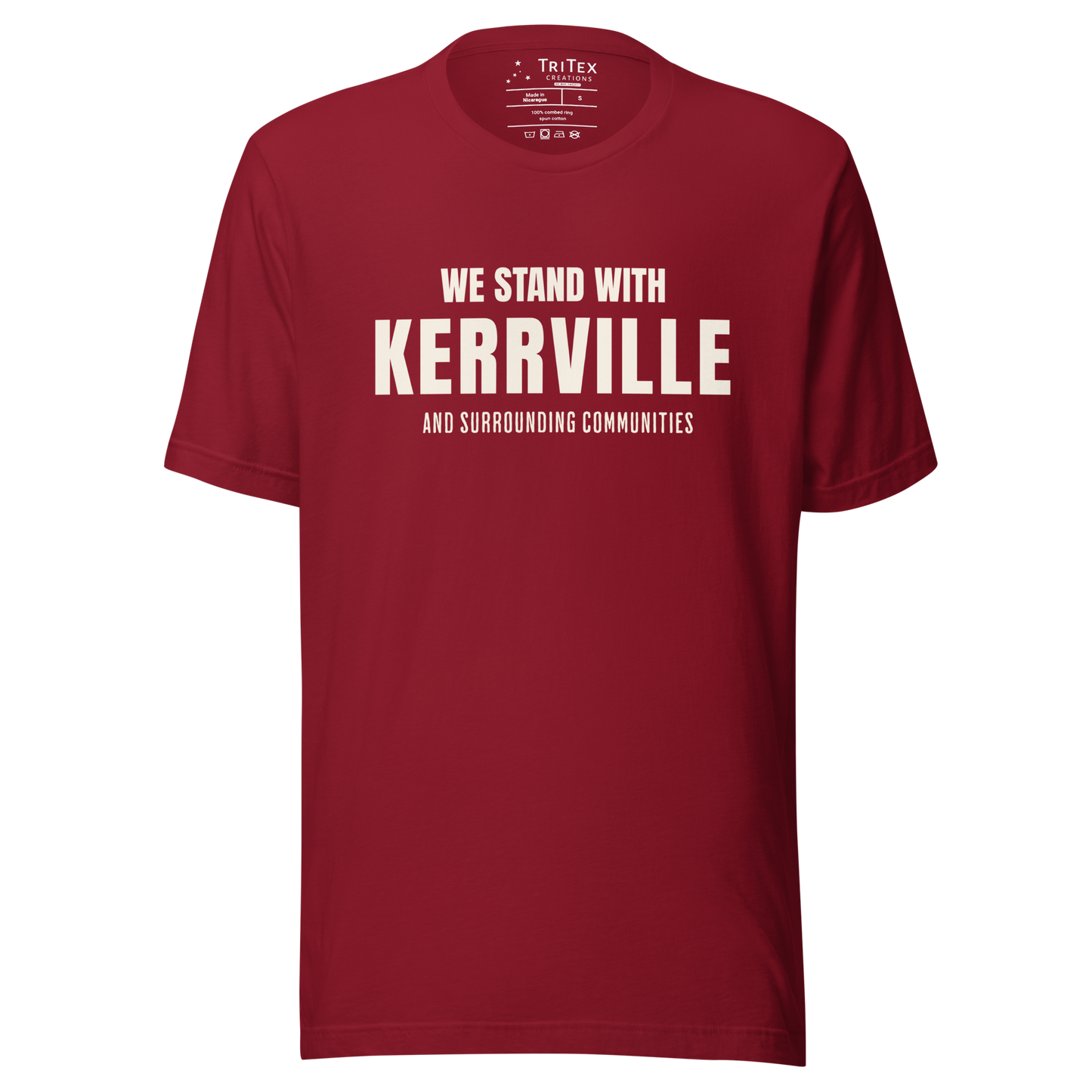 A cardinal red t-shirt with the words "We stand with Kerrville and surrounding communities".