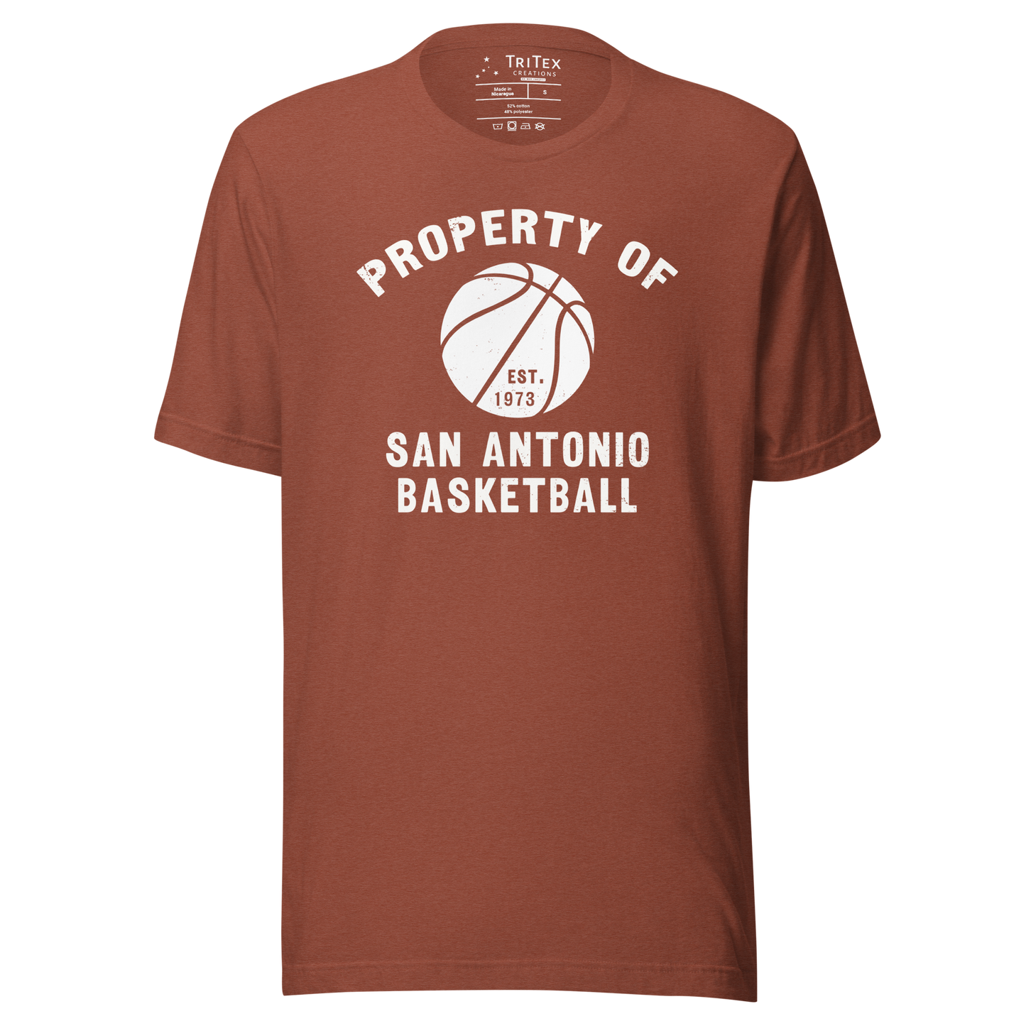 A heather clay t-shirt featuring a silhouette of a basketball with the words "Property of San Antonio basketball Est. 1973".