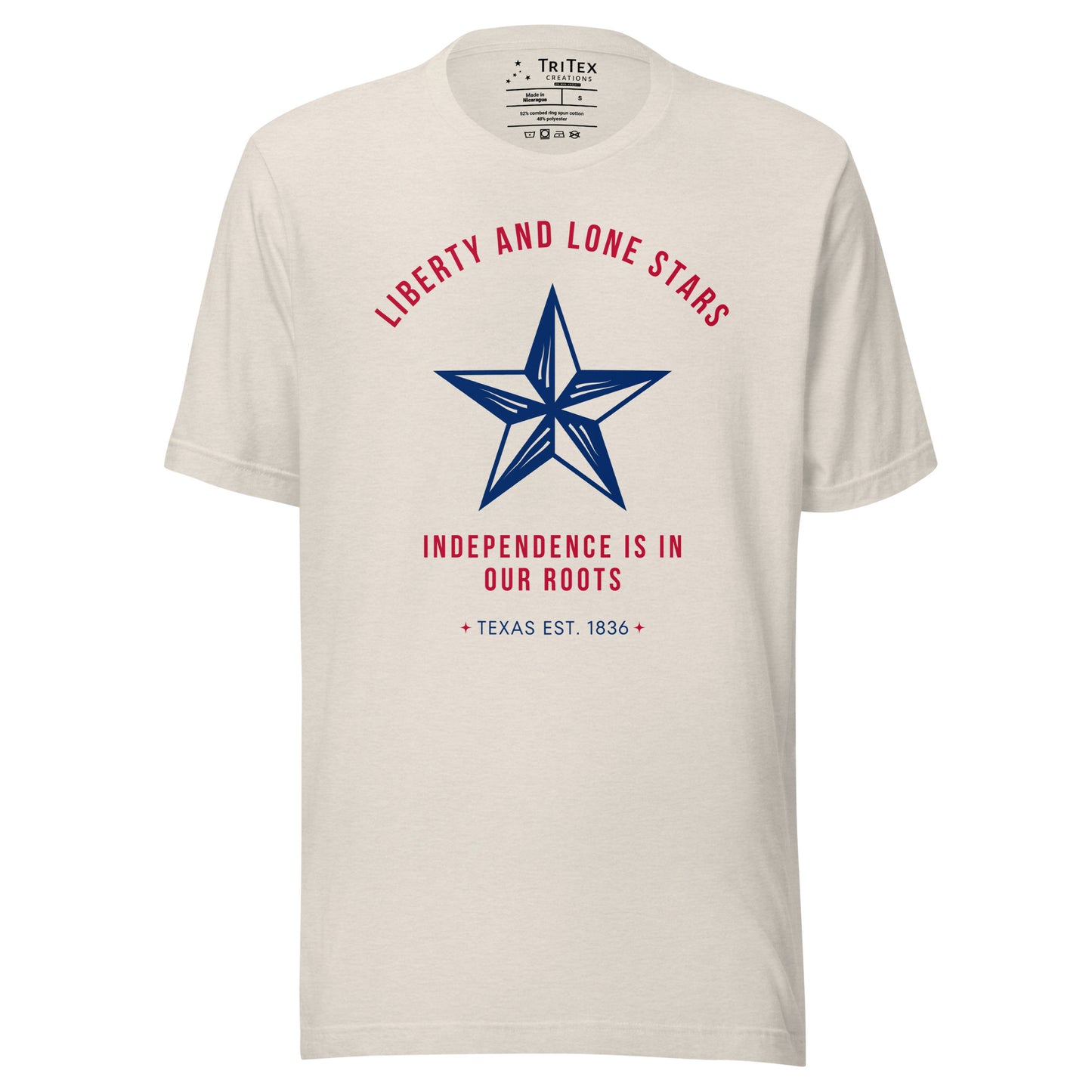 A heather dust shirt featuring a 5-pointed star with the words "Liberty and lone stars. Independence is in our roots. Texas Est. 1836".