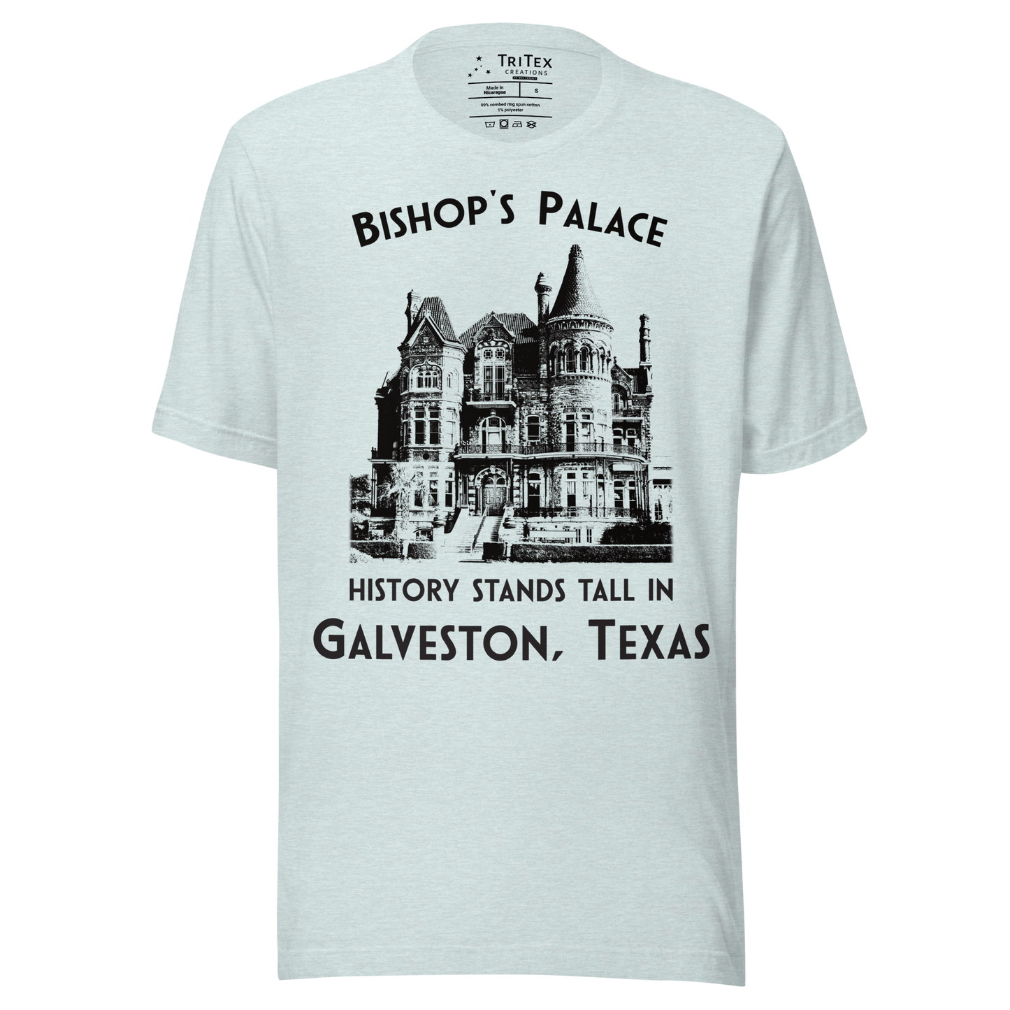 A heather prism ice blue t-shirt featuring a vintage-style picture of Bishop's Palace with the text "Bishop's Palace. History stands tall in Galveston, Texas".