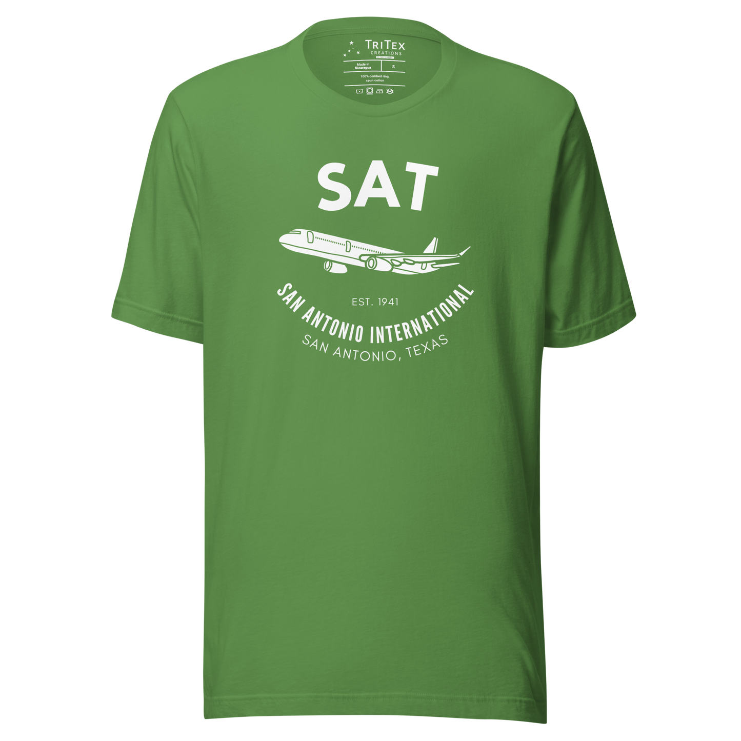 A leaf green t-shirt featuring a silhouette of a passenger plane with the text "SAT. Est. 1941. San Antonio International. San Antonio, Texas".