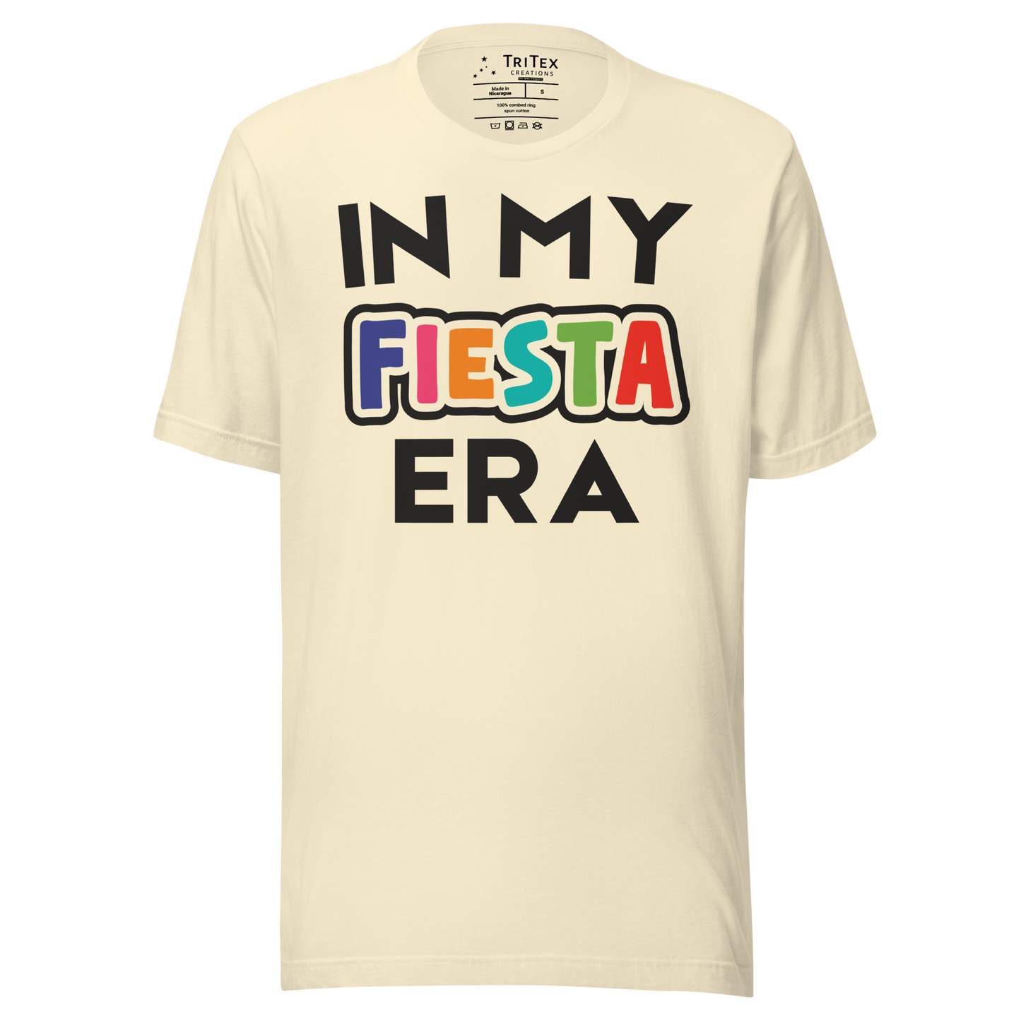 A natural-colored t-shirt that reads "In My Fiesta Era" with Fiesta in Southwestern colors.