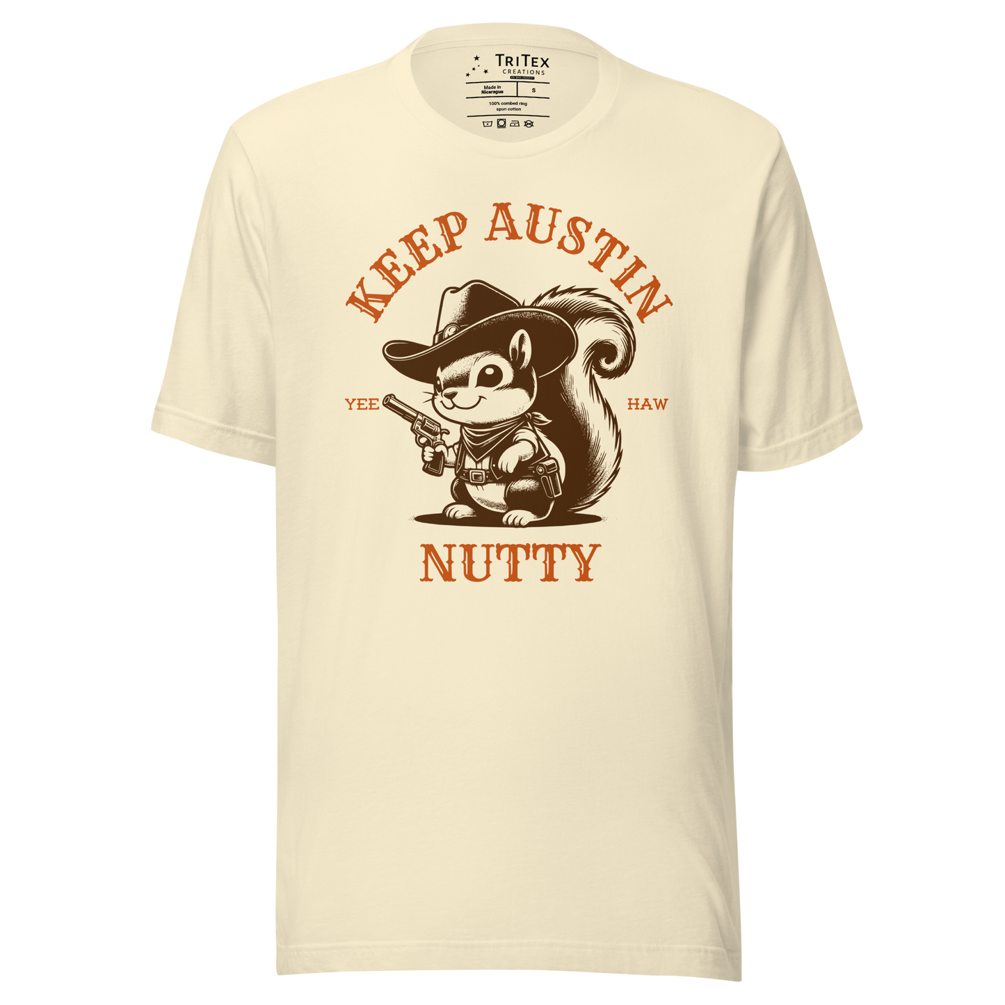 A natural-colored t-shirt featuring a vintage illustration of a squirrel dressed like a cowboy with text that reads "Keep Austin Nutty. Yee Haw".