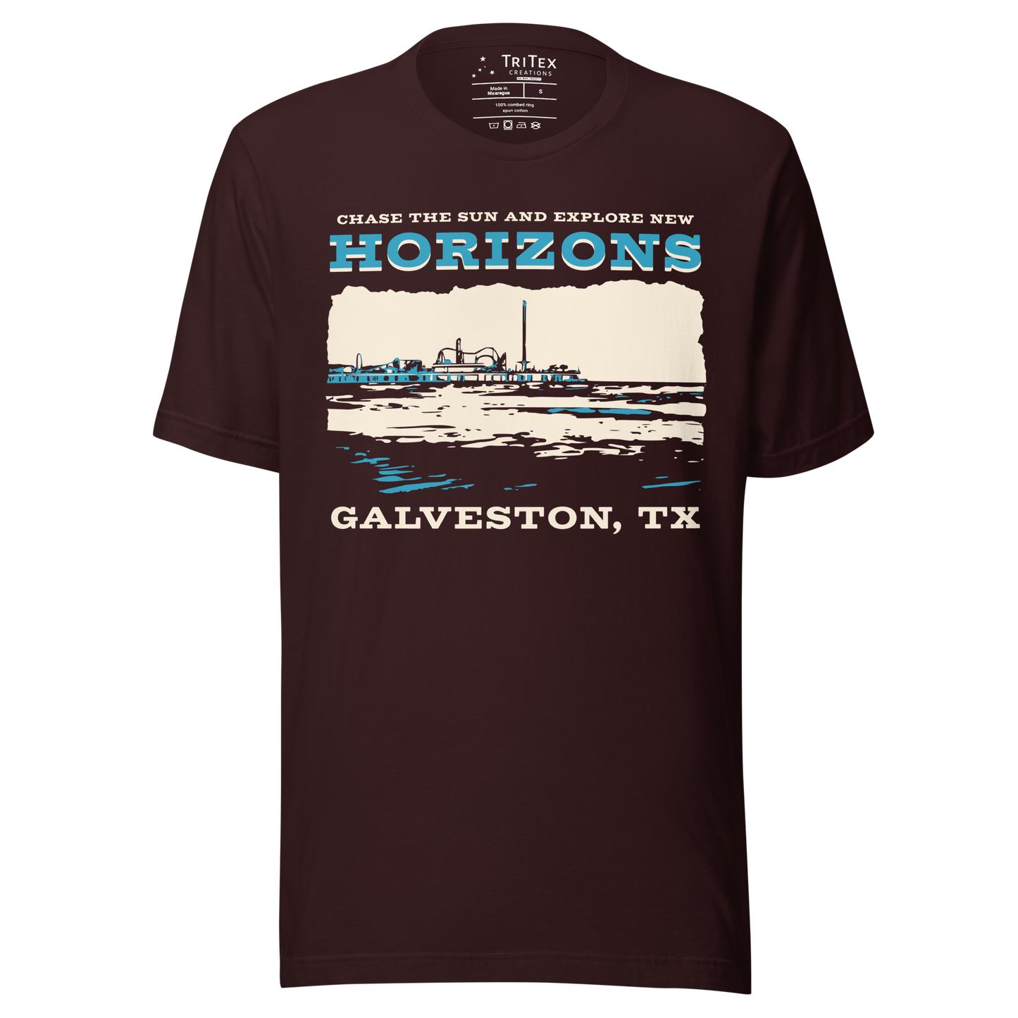 An oxblood black t-shirt featuring Pleasure Pier and the shoreline with the words "Chase the sun and explore new horizons Galveston, TX".