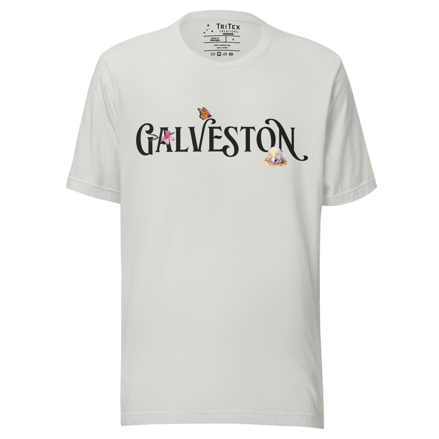 A silver t-shirt with the name of "Galveston" amongst oleanders, butterflies and seashells.