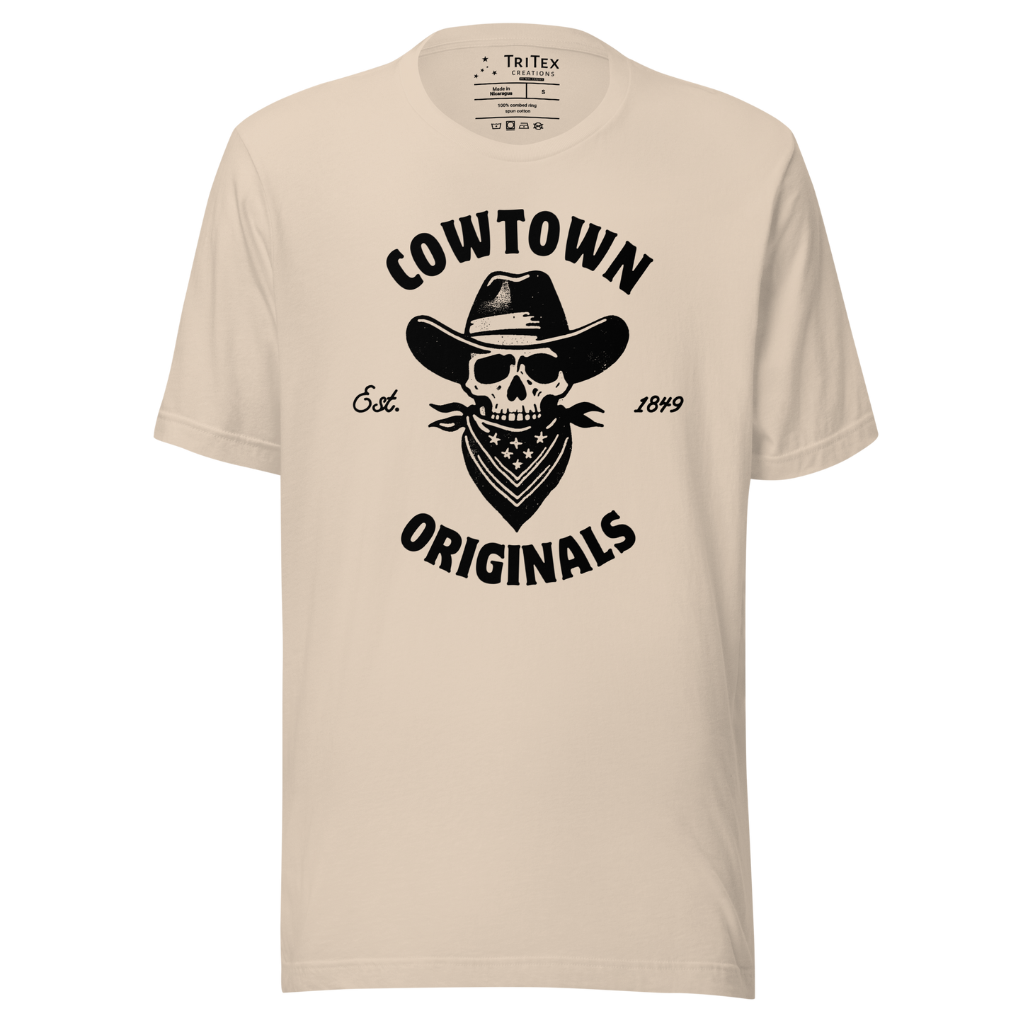 A soft cream t-shirt with an image of a  skull in a cowboy hat and kerchief which reads "Cowtown Originals Est. 1849".