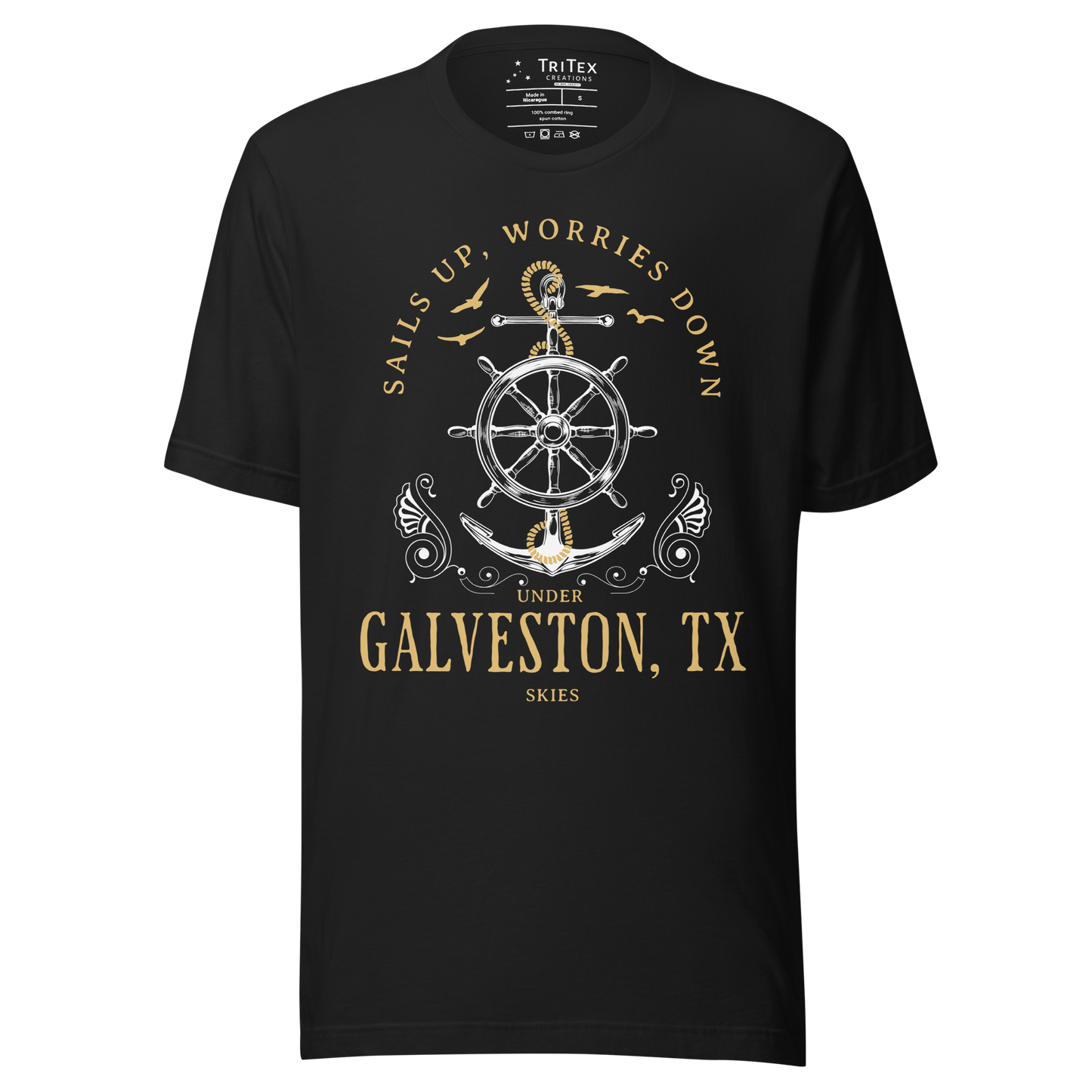 A vintage black t-shirt featuring an anchor and seagulls with the words "Sails up, worries down under Galveston, TX skies".