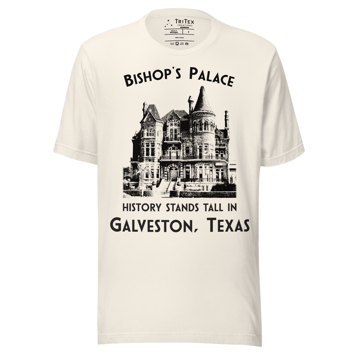 A vintage white t-shirt featuring a vintage-style picture of Bishop's Palace with the text "Bishop's Palace. History stands tall in Galveston, Texas".