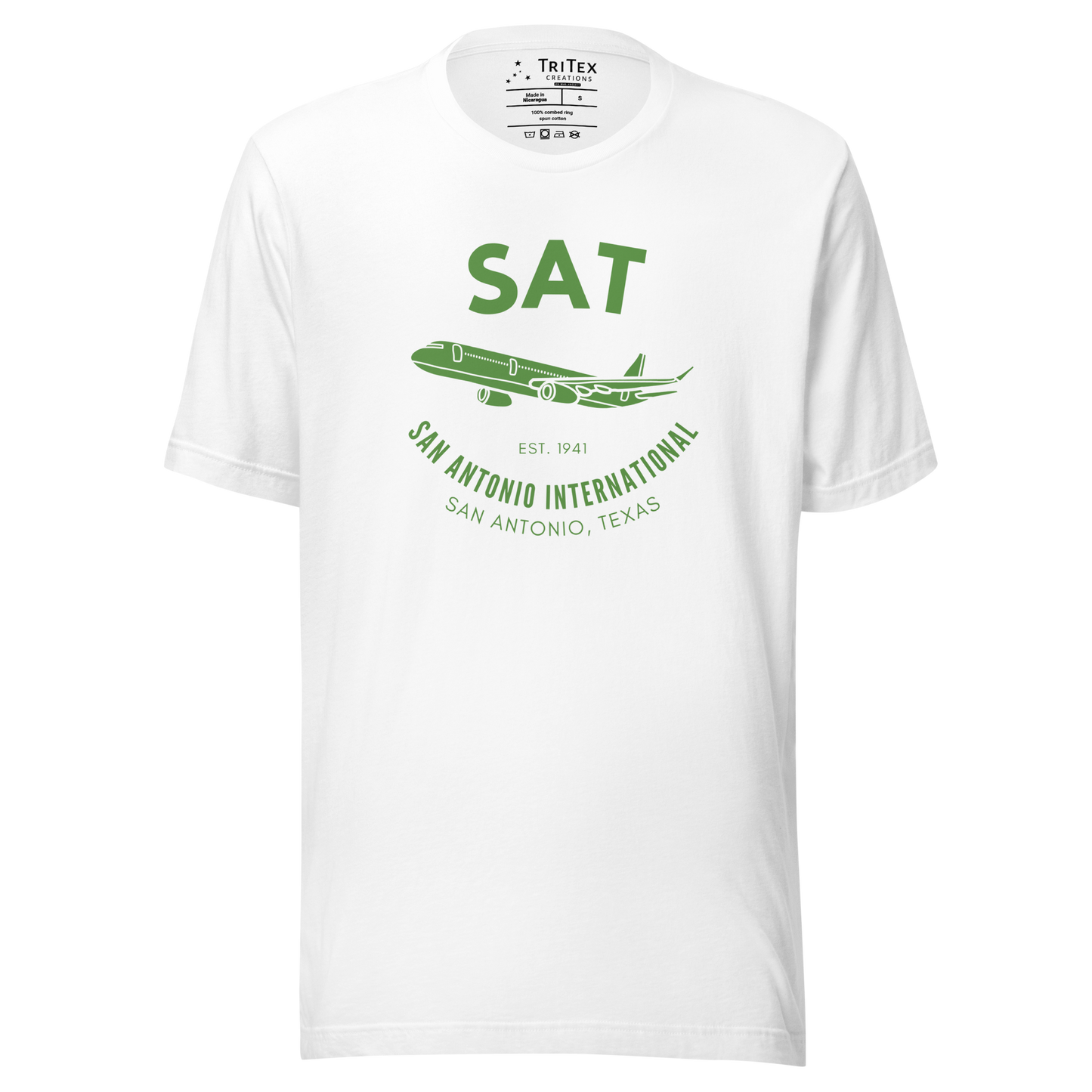A white t-shirt featuring a silhouette of a passenger plane with the text "SAT. Est. 1941. San Antonio International. San Antonio, Texas".