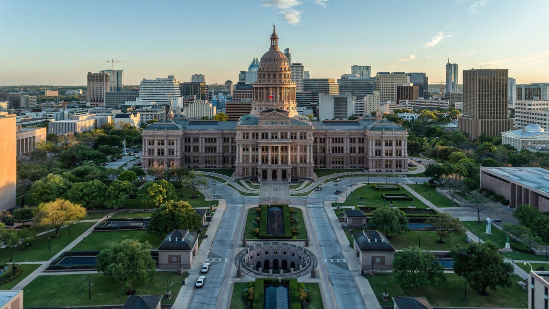 An aerial view showing the entirety of the Texas State Capitol in Austin.