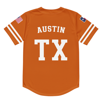 The back of an orange baseball jersey with the words "Austin, TX".