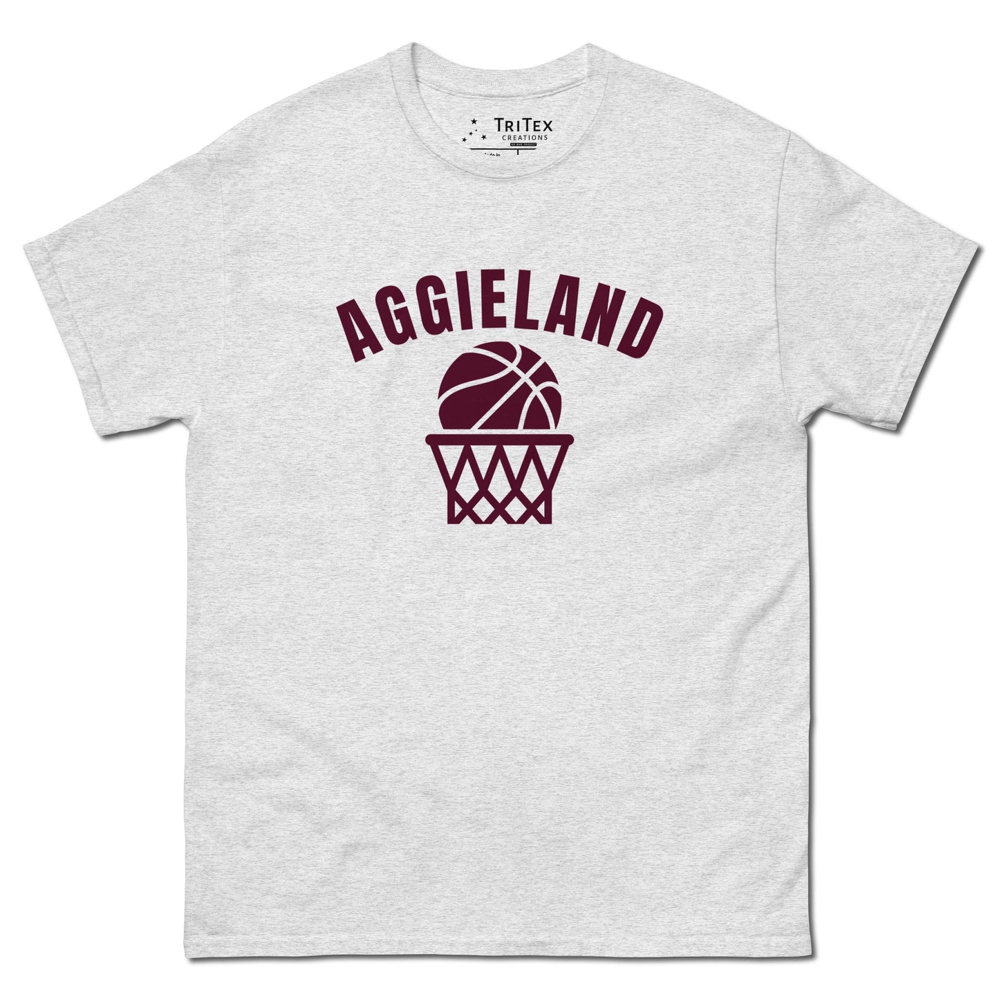 An ash-colored t-shirt featuring a basketball in a net with the word "Aggieland".