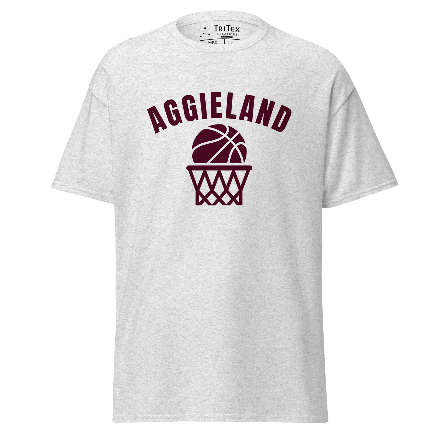 An ash-colored t-shirt featuring a basketball in a net with the word "Aggieland".
