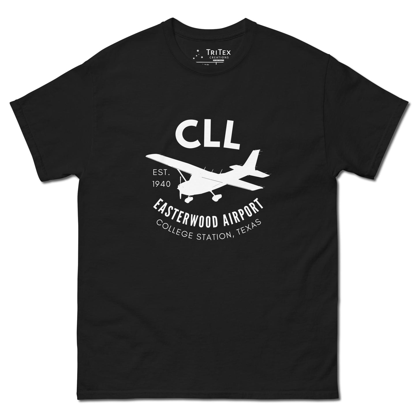 A black t-shirt featuring a silhouette of a Cessna airplane with the words "CLL Est. 1940 Easterwood Airport College Station, Texas".