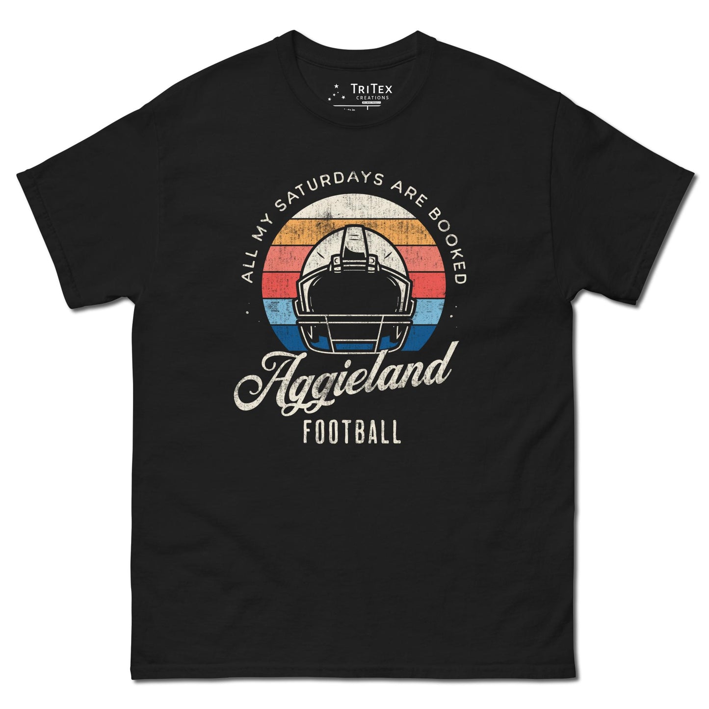 A black t-shirt featuring a football helmet and the words "All my Saturdays are booked Aggieland Football".