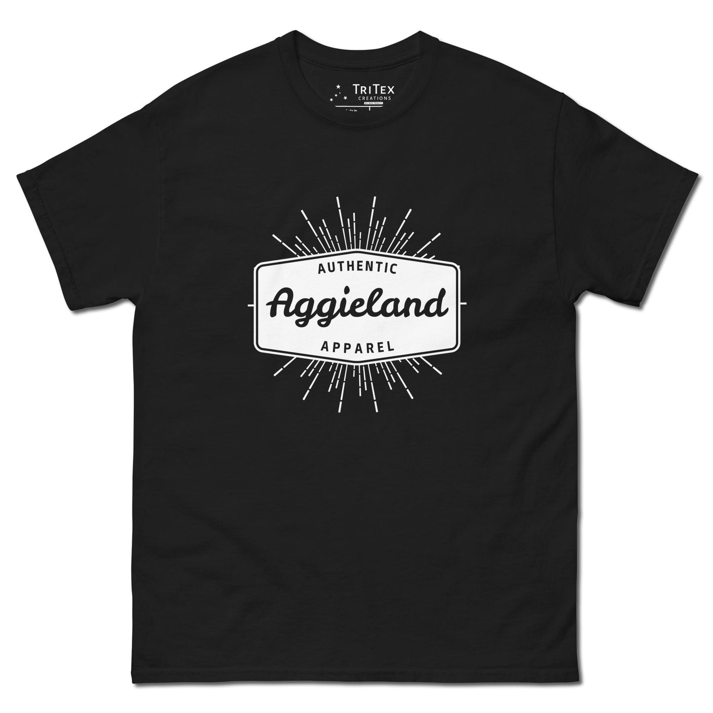 A black t-shirt with a badge that says "Authentic Aggieland apparel".