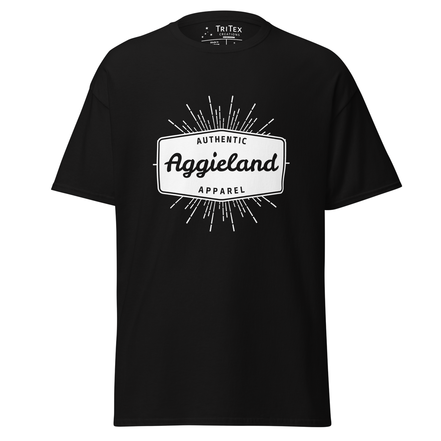A black t-shirt with a badge that says "Authentic Aggieland apparel".