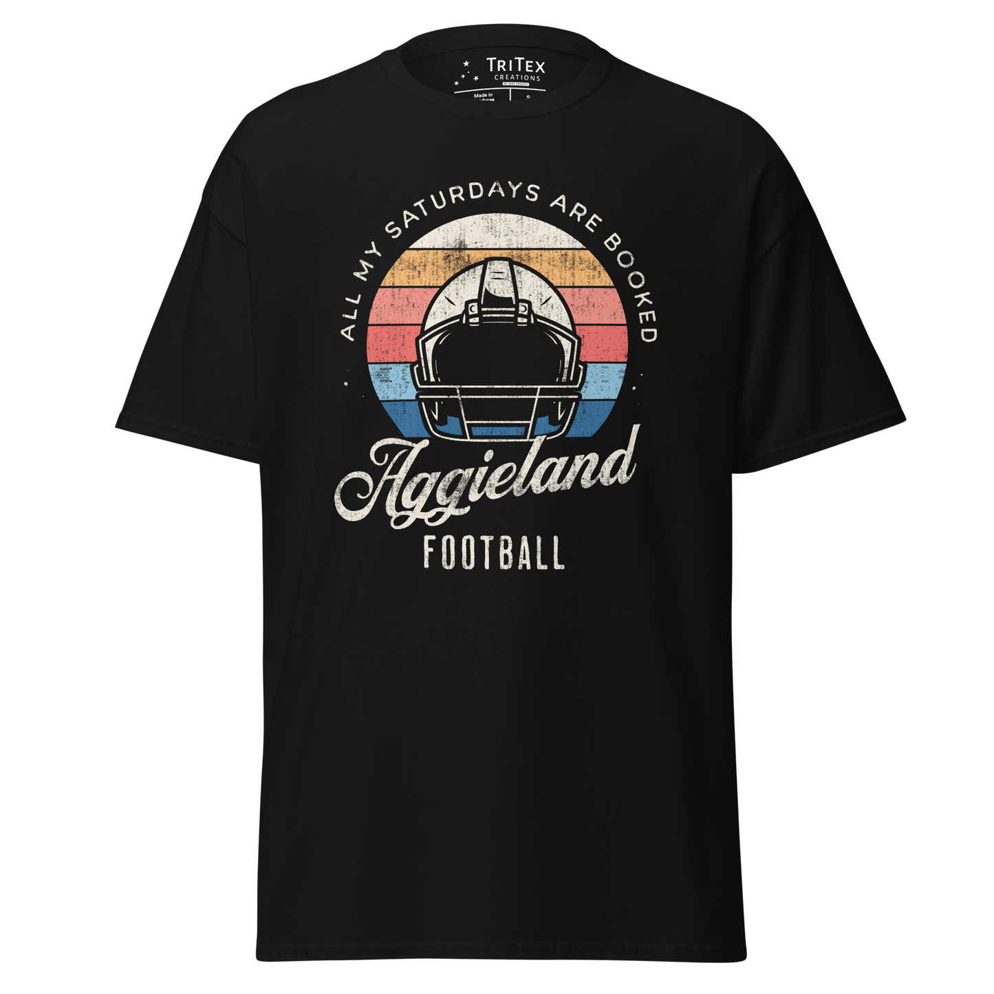 A black t-shirt featuring a football helmet and the words "All my Saturdays are booked Aggieland Football".
