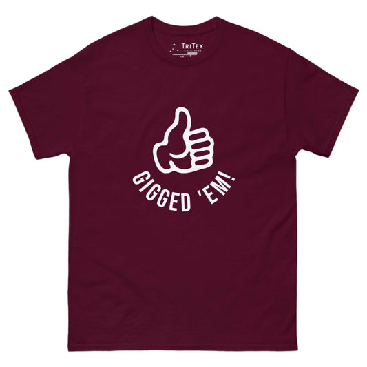 A maroon t-shirt featuring a left hand with it's thumb up and the text "Gigged 'em!".