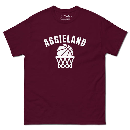 A maroon t-shirt featuring a basketball in a net with the word "Aggieland".