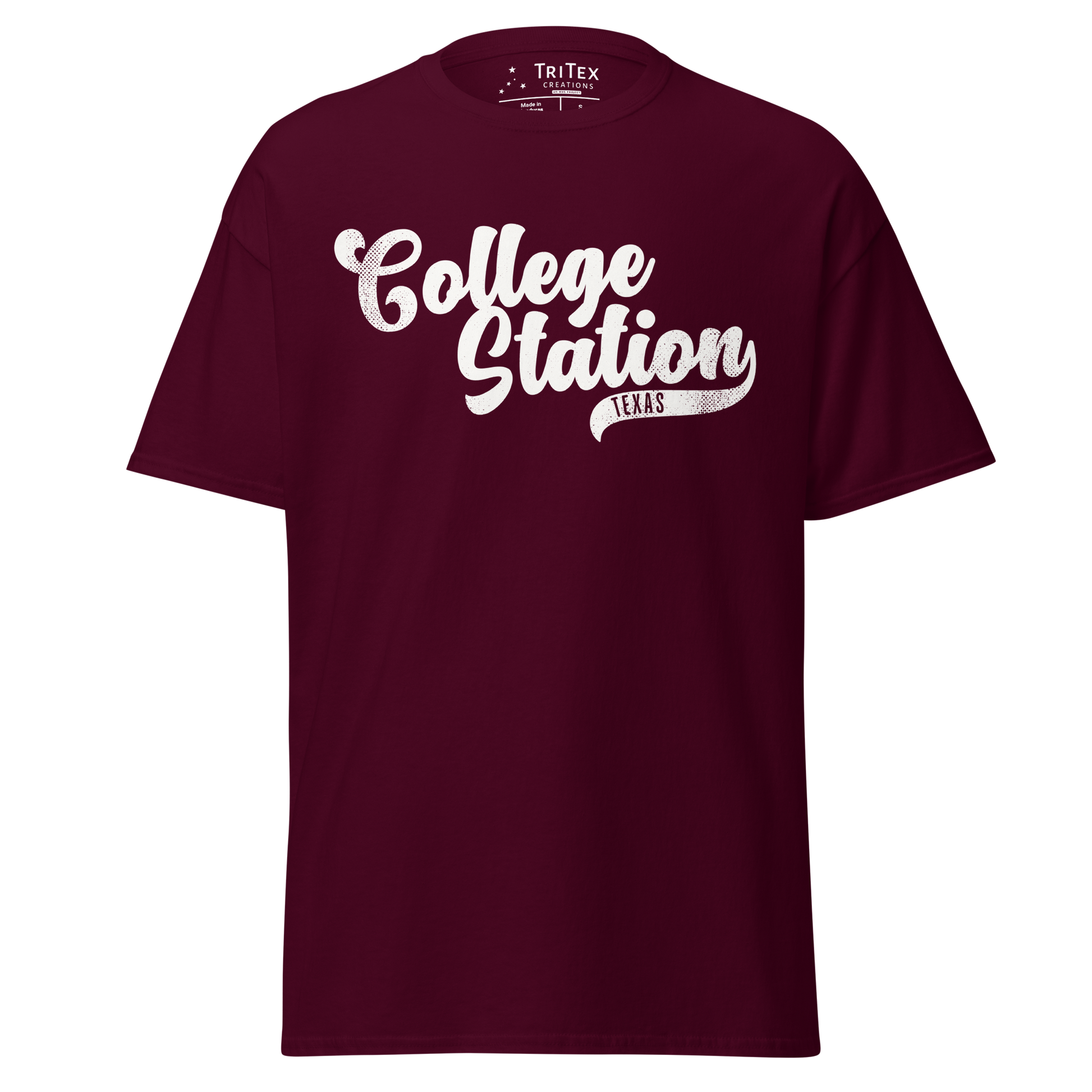 A maroon vintage-style t-shirt with the text "College Station TEXAS".