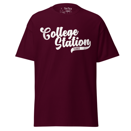 A maroon vintage-style t-shirt with the text "College Station TEXAS".
