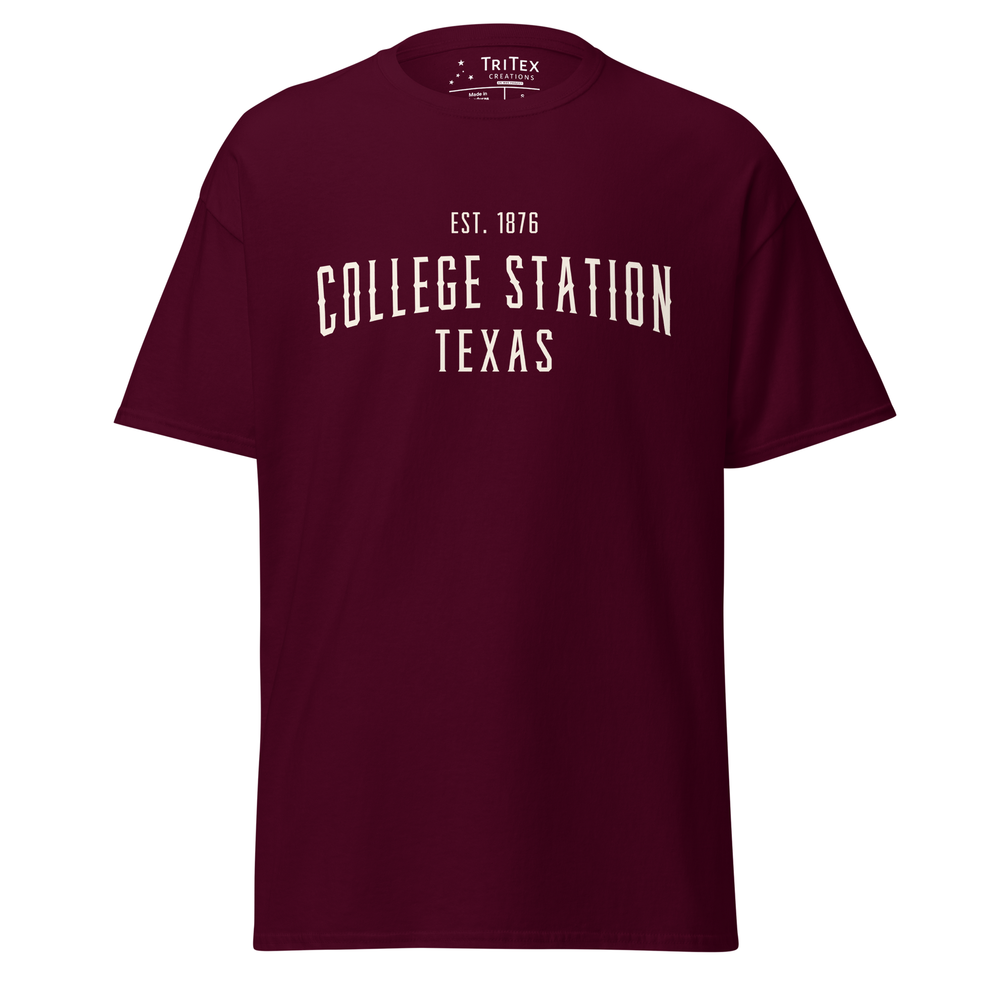 A maroon t-shirt with the words "College Station Texas Est. 1876".