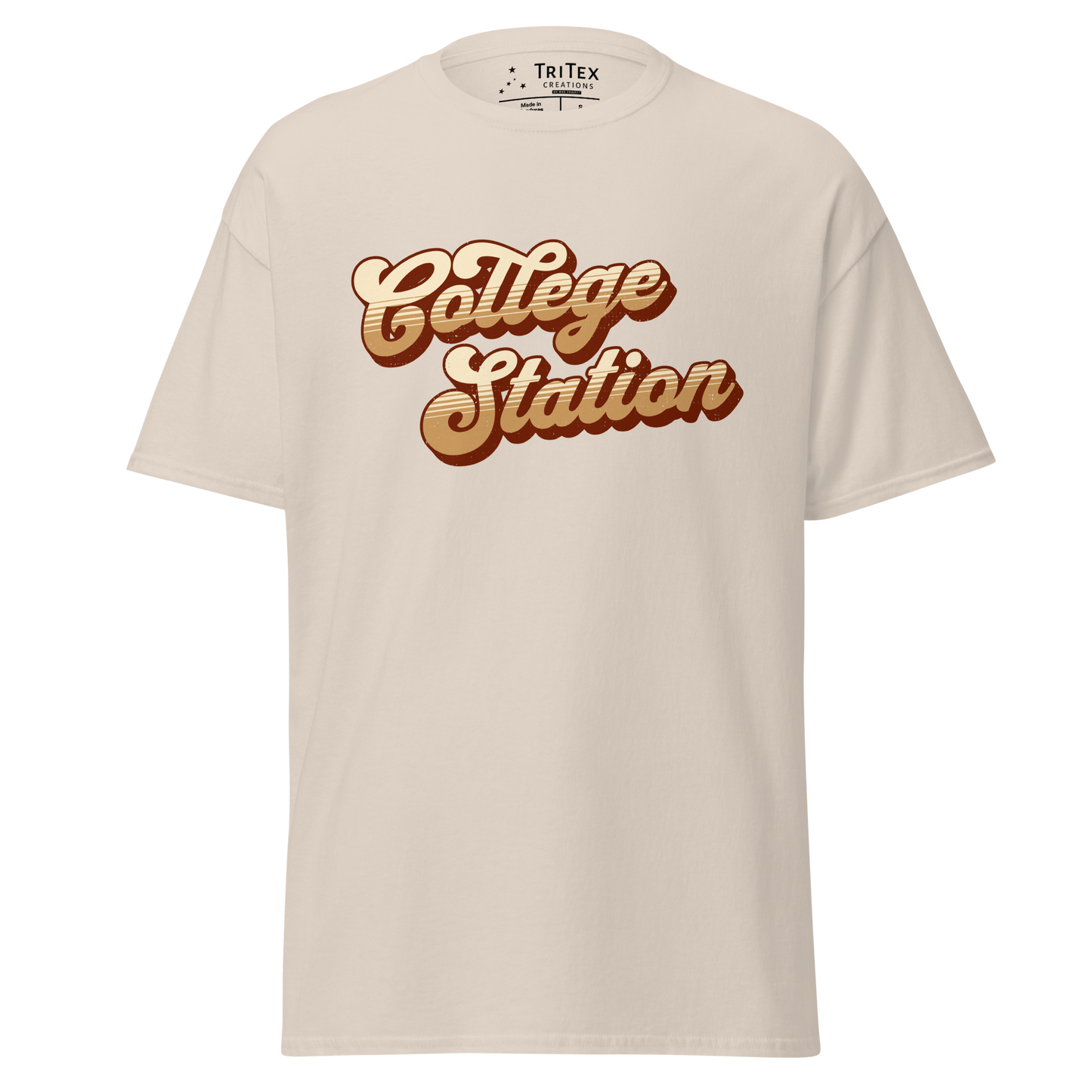 A natural-colored t-shirt with a retro style College Station in a vintage font.
