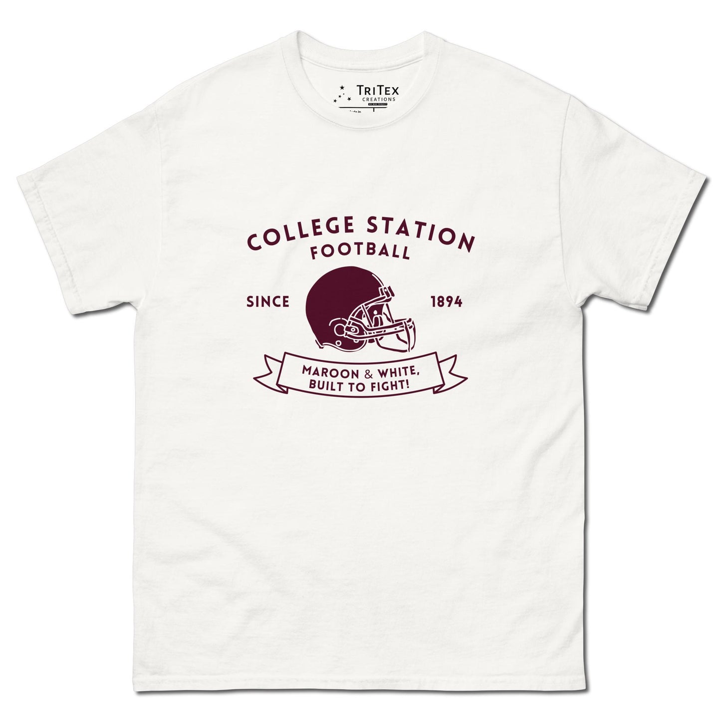 A white shirt with the text "College Station football since 1894 Maroon & White, Built to fight!" featuring an image of a football helmet.