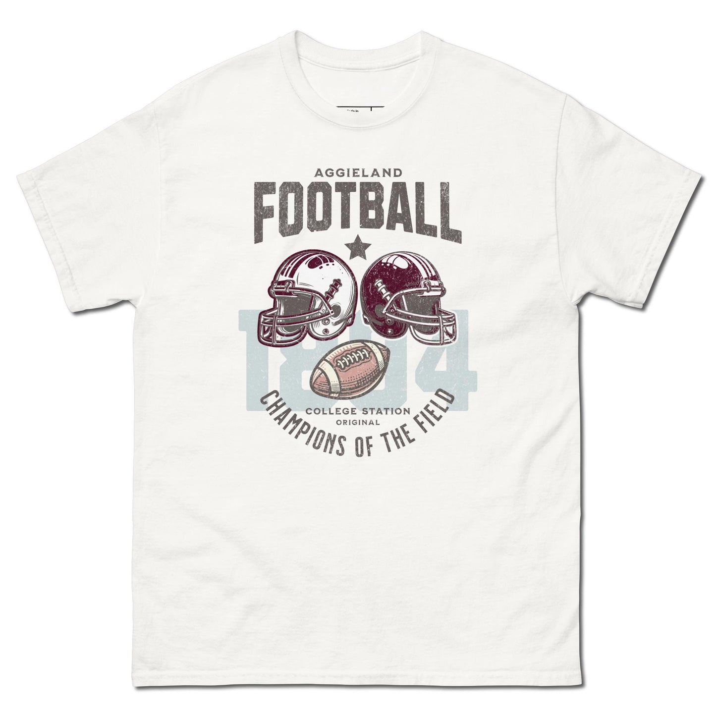 A white t-shirt featuring football helmets and a football with the text "Aggieland Football College Station original Champions of the field"