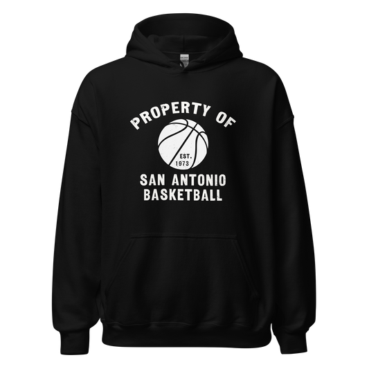 A black hoodie featuring a silhouette of a basketball with the words "Property of San Antonio basketball Est. 1973".