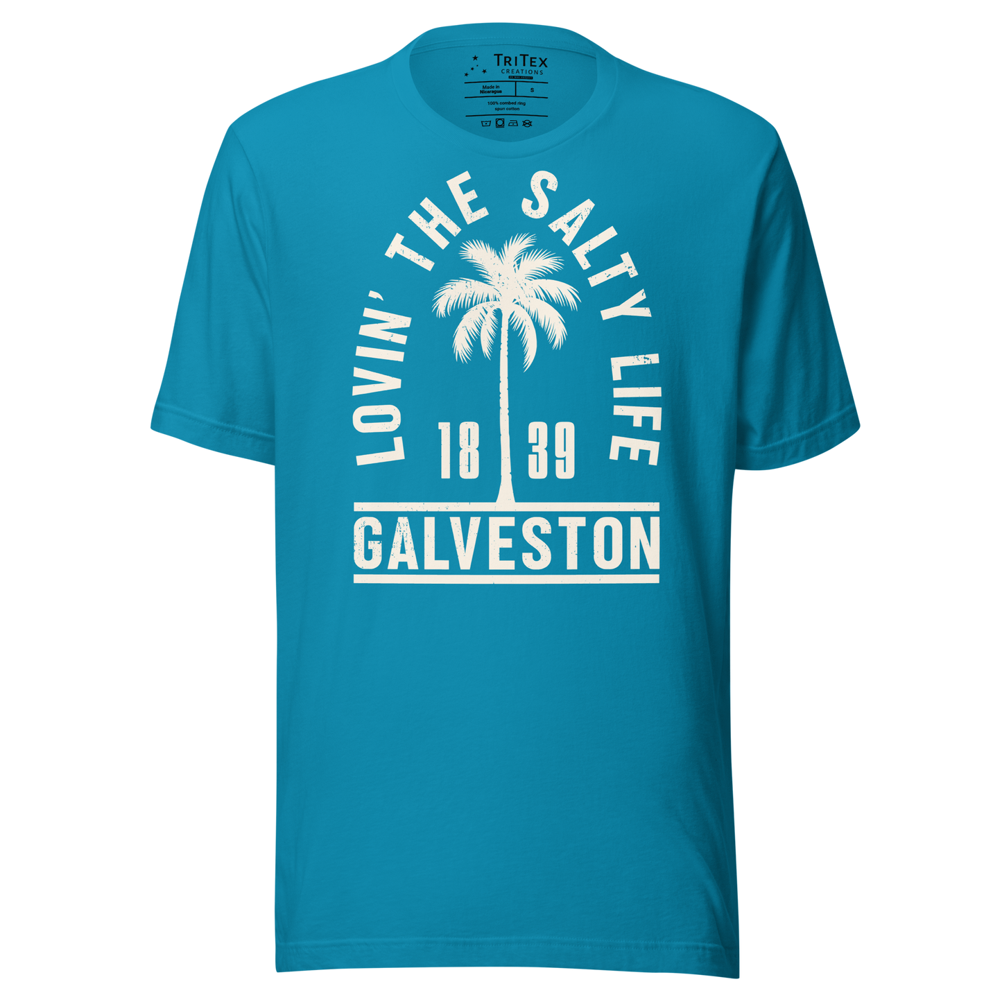 An aqua blue t-shirt featuring the silhouette of a palm tree with the words "Lovin' the salty life. Galveston 1839".