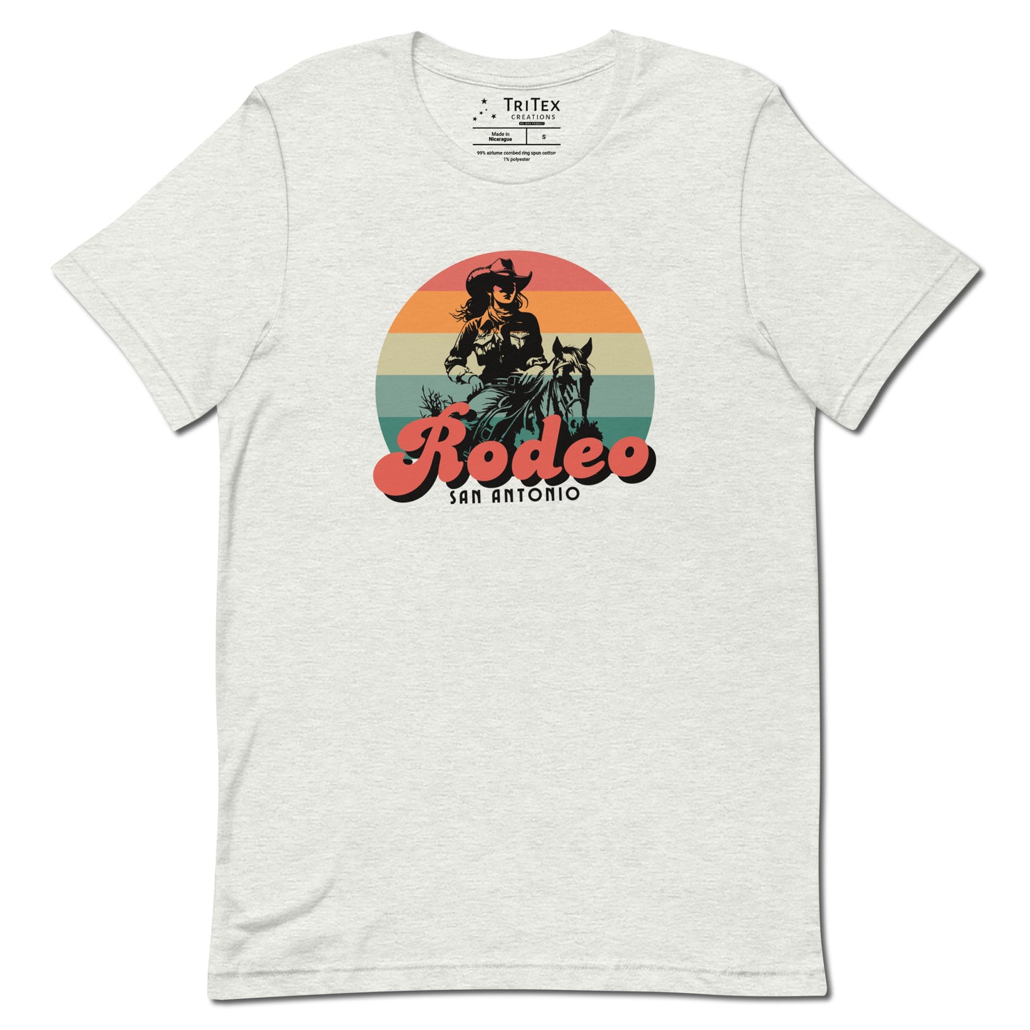 An ash-colored t-shirt with an illustration of a cowgirl and the text "Rodeo San Antonio".