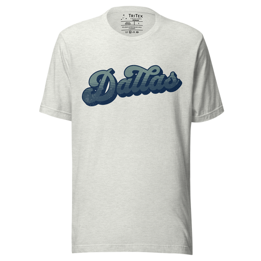 An ash-colored t-shirt with a retro style Dallas in a vintage font.