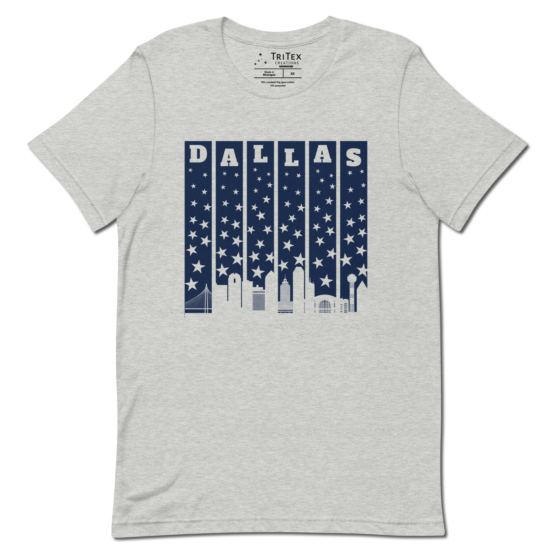 An athletic heather t-shirt with with the silhouette of the Dallas skyline underneath some stars and the name "Dallas".