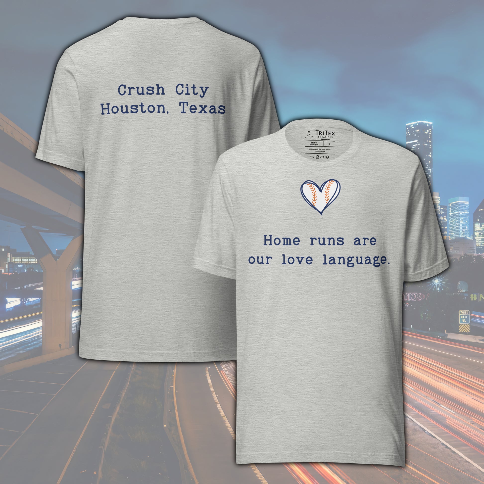 An athletic heather t-shirt picturing a heart-shaped baseball with the text "Home runs are our love language".