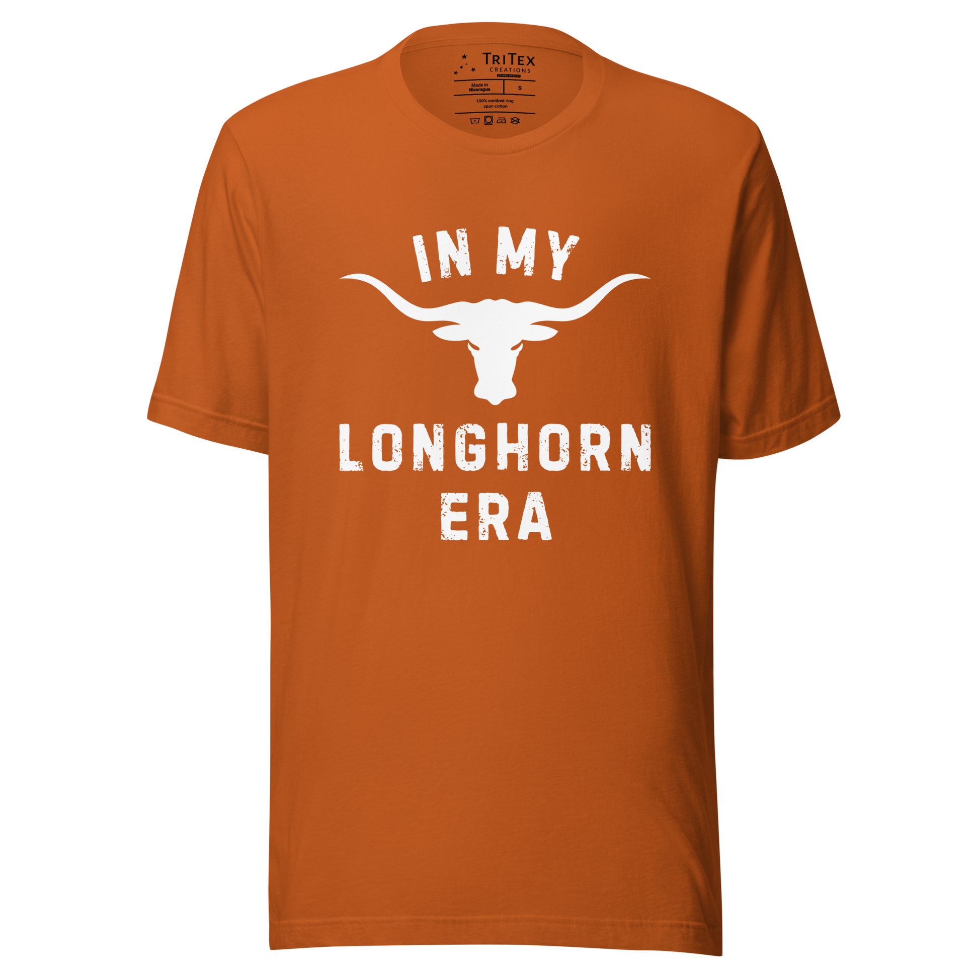 An autumn-colored t-shirt featuring a silhouette of a longhorn bull with the text "In my longhorn era".