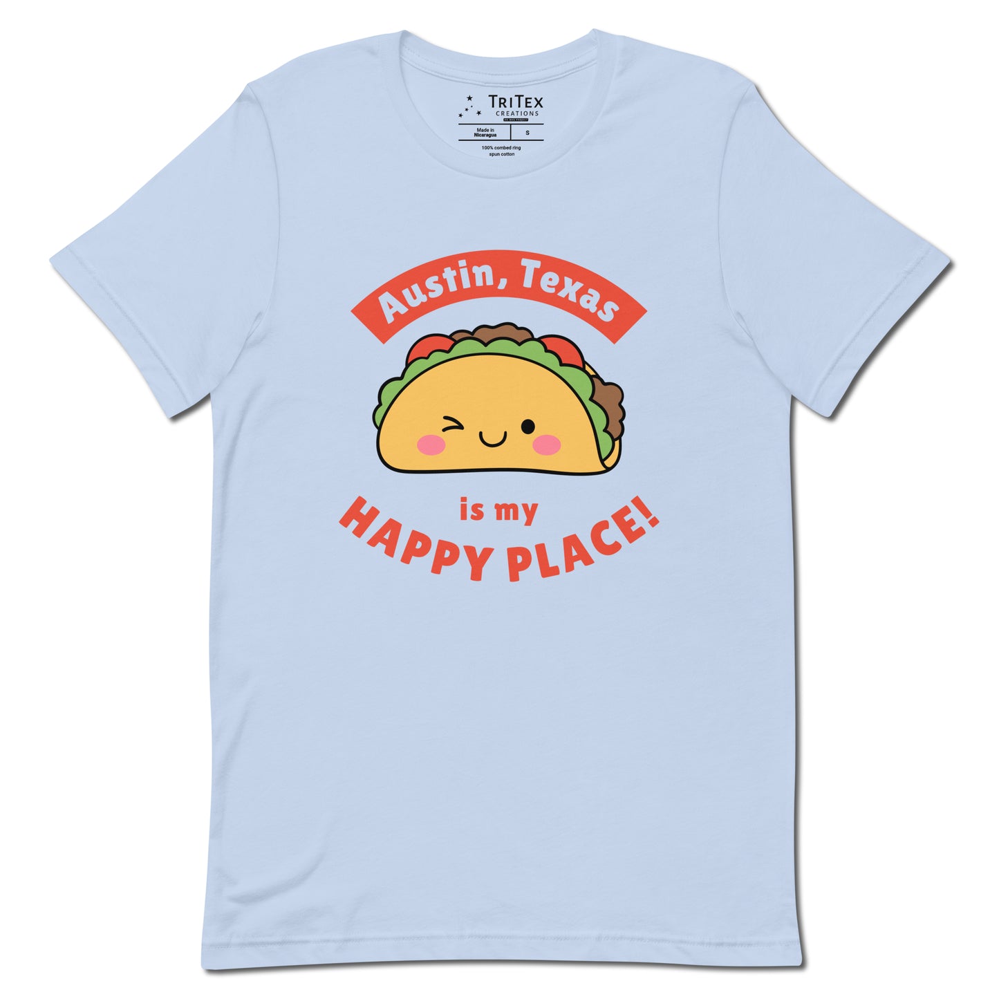 A baby blue t-shirt featuring a smiling, winking cartoon taco with the words "Austin, Texas is my happy place!".