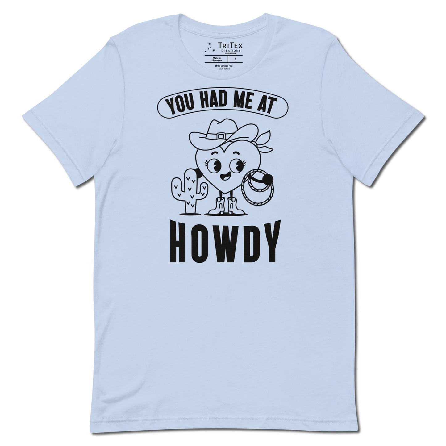 A baby blue t-shirt featuring a cartoon heart dressed like a cowboy with the words "You has me at howdy".