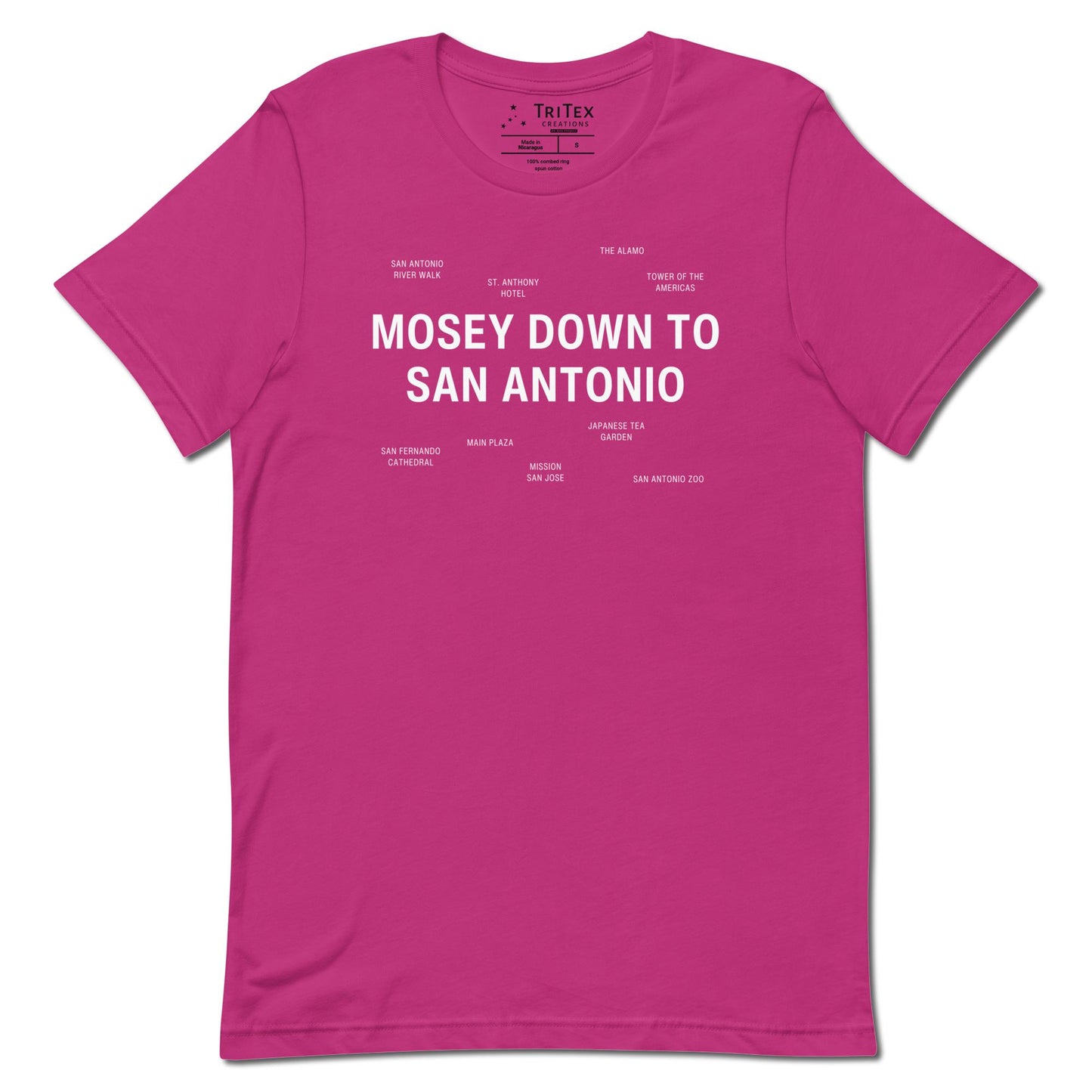 A berry pink t-shirt which reads "Mosey Down To San Antonio" in big, bold text with smaller text elements naming San Antonio's landmarks.