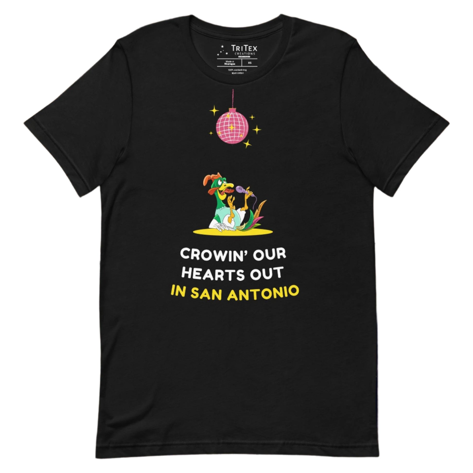 A black t-shirt featuring a rooster singing it's lungs out under a disco ball above the words "Crowin' our hearts out in San Antonio".