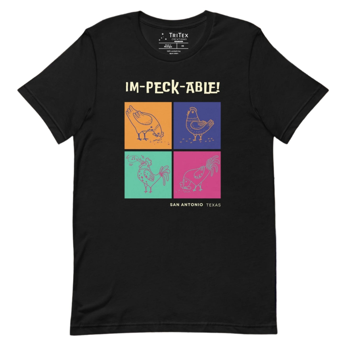 A black t-shirt featuring cartoon chickens with the text "Im-peck-able! San Antonio Texas"