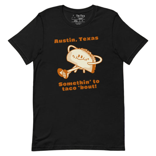 A black shirt featuring a taco lounging with the text "Austin, Texas. Somethin' to taco 'bout!"