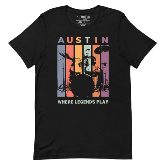 A black t-shirt featuring a silhouette of a drummer with the words "Austin. Where legends play".